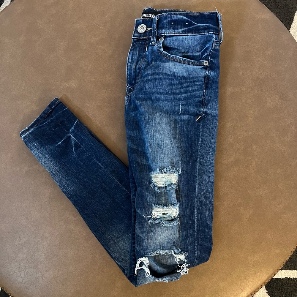 Express distressed mid rise skinny jeans